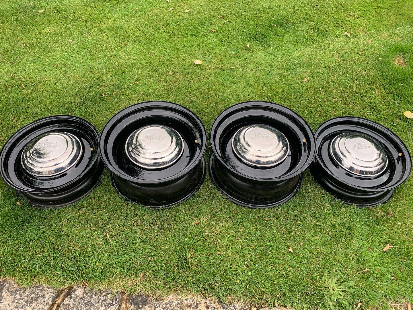 4 Steel Wheels with Multi Stud Pattern. Ford Centre Caps