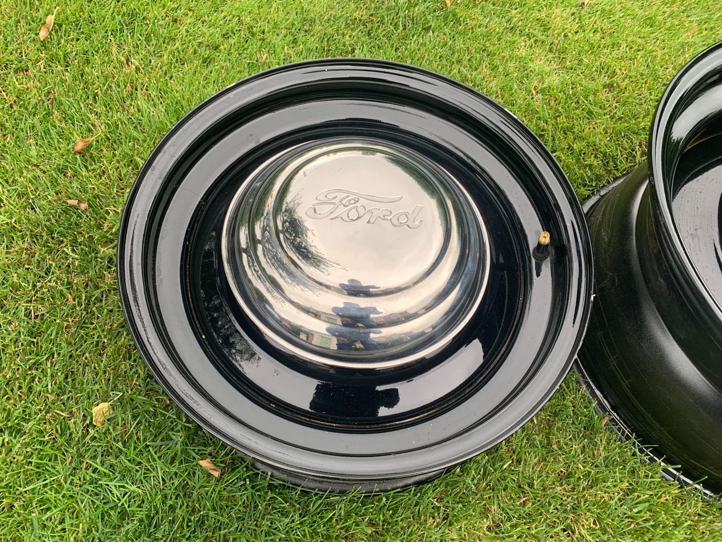 4 Steel Wheels with Multi Stud Pattern. Ford Centre Caps