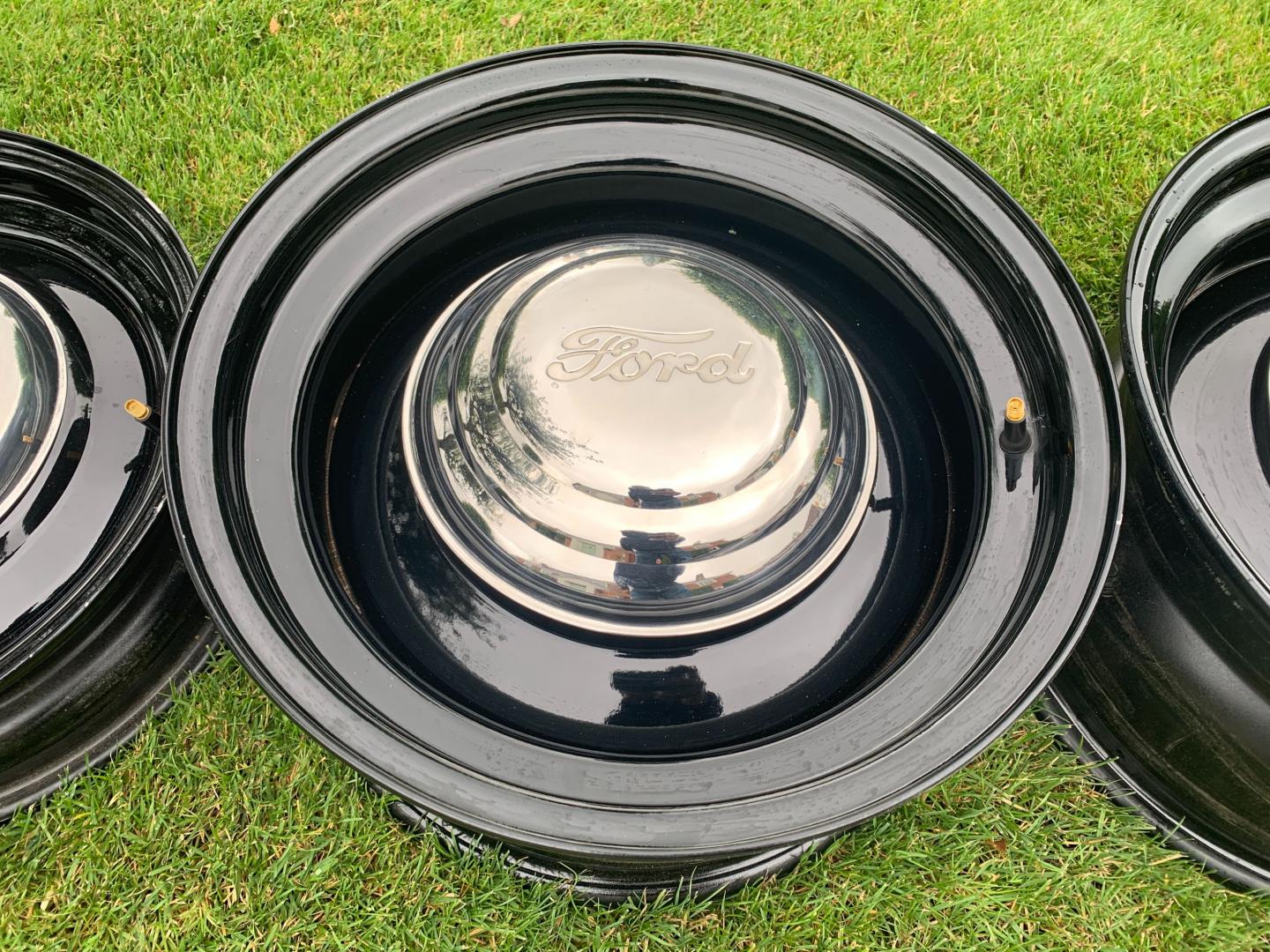 4 Steel Wheels with Multi Stud Pattern. Ford Centre Caps