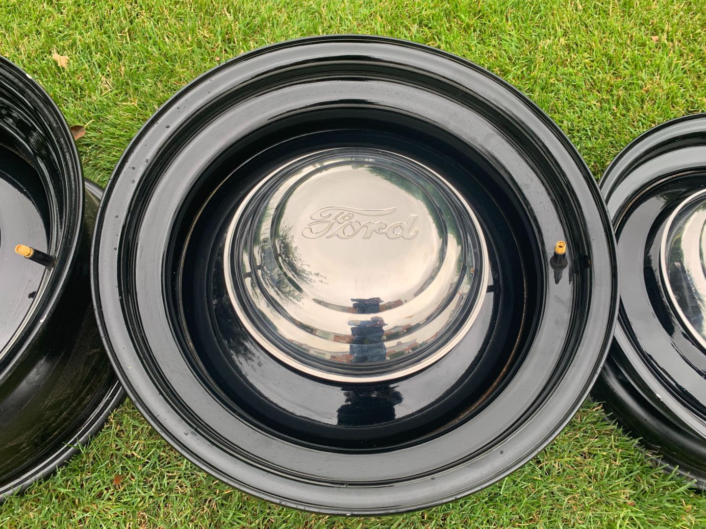 4 Steel Wheels with Multi Stud Pattern. Ford Centre Caps